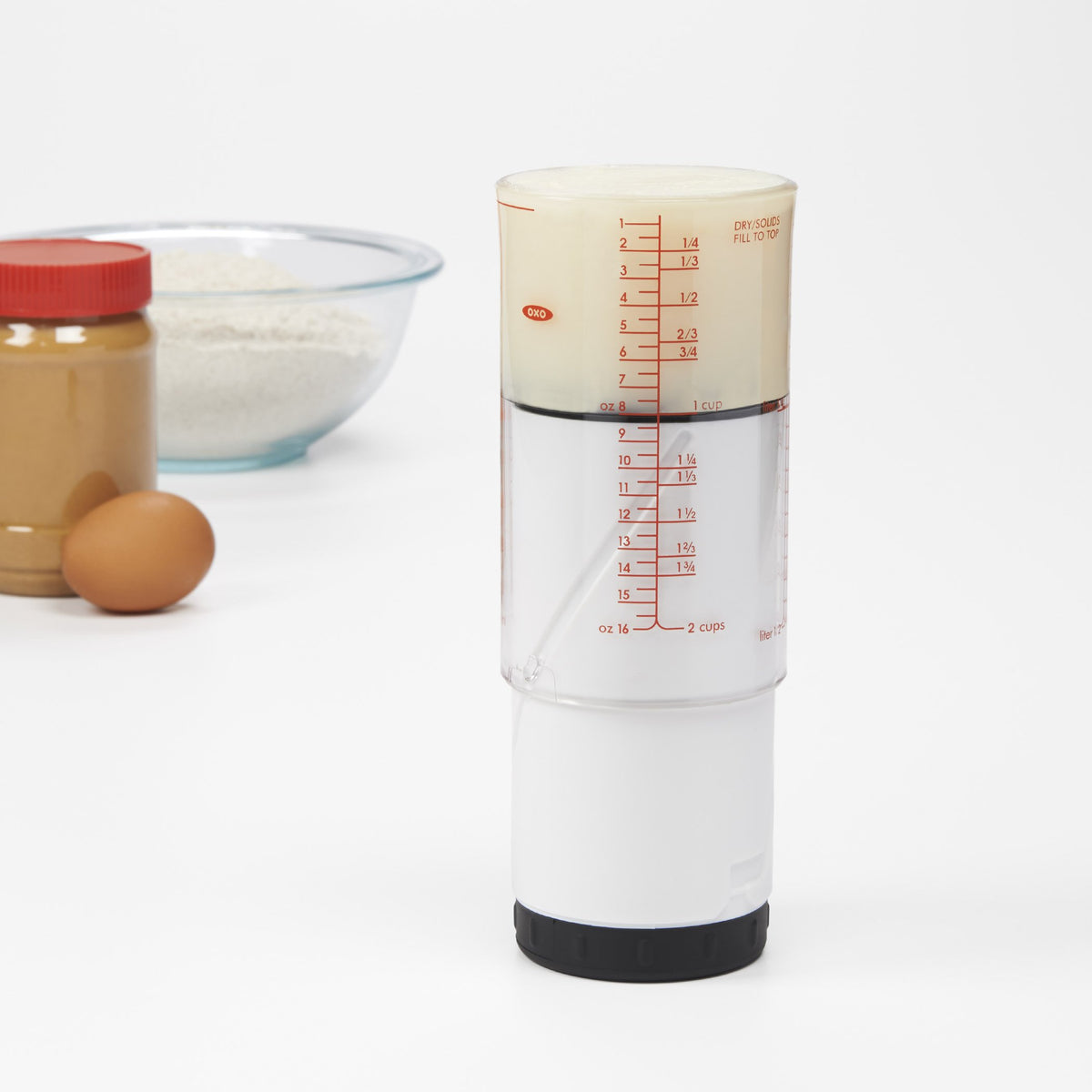 OXO Good Grips 2 Cup adjustable measuring cup dial close-up showing precise measurement control