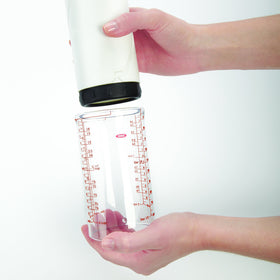 OXO Good Grips 2 Cup adjustable measuring cup dishwasher safe label on exterior