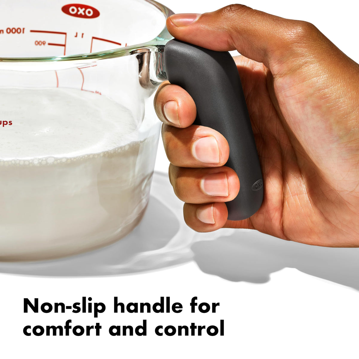 OXO Good Grips measuring cup with dripless pour spout for precise liquid transfer