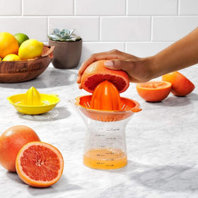 OXO Good Grips 2-in-1 citrus juicer shows measurement marks up to 1.5 cups for precise recipes.