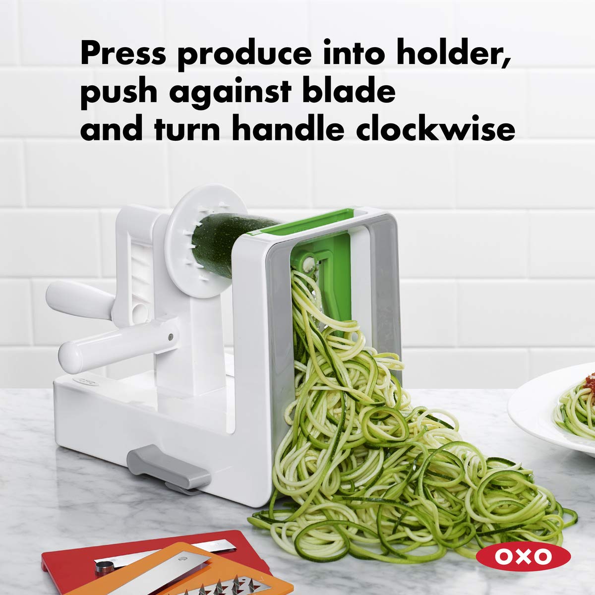 OXO Good Grips rotating handle with side grip guides produce through blades.