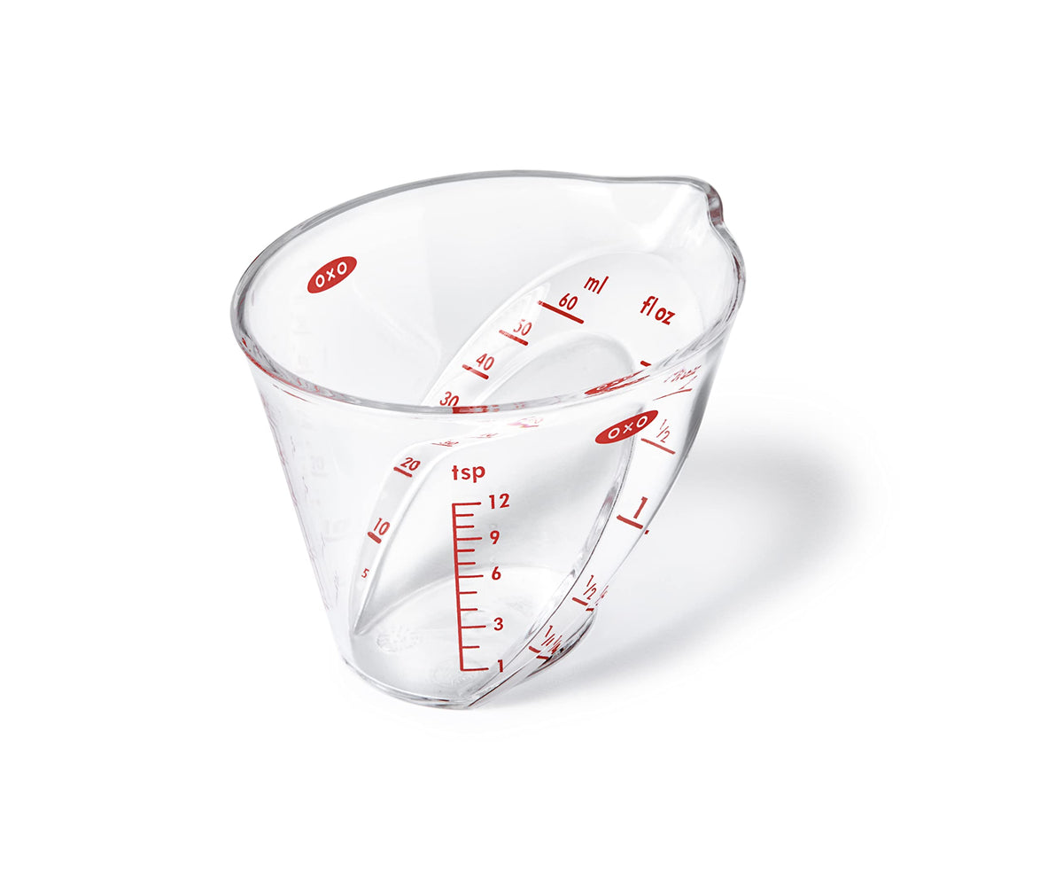 OXO Good Grips 60mL mini angled jug reads measurements from above for accuracy