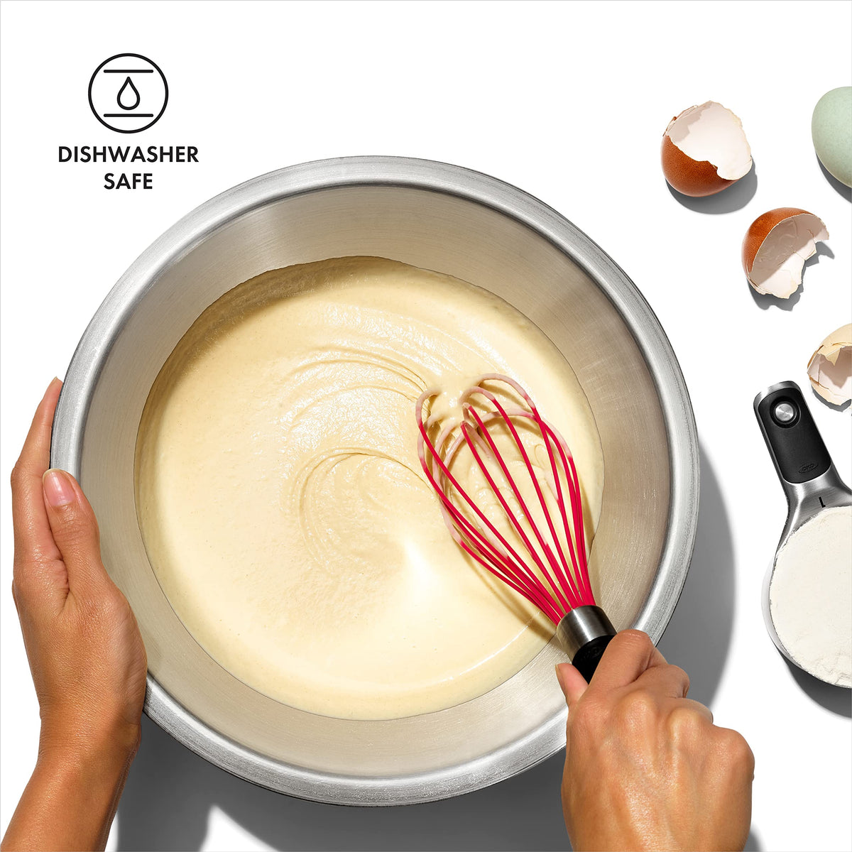 OXO Good Grips red-handle whisk offers ergonomic, non-slip grip.