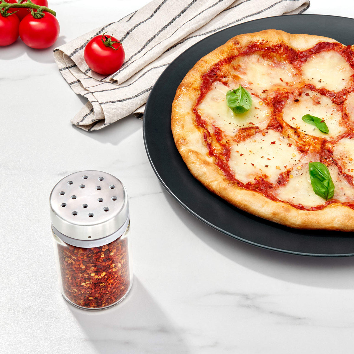 OXO Good Grips Adjustable Shaker large holes ideal for red pepper flakes and dried herbs.