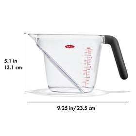 OXO Good Grips angled measuring cup displays cup, ounce, and milliliter markings.