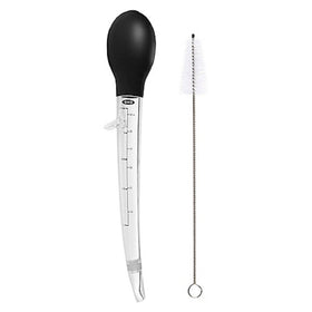 OXO Good Grips angled turkey baster pour image shows easy juice suction and reach into pans