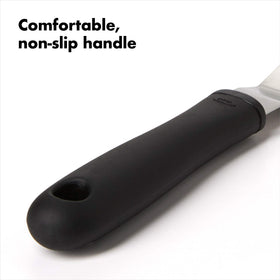 OXO Good Grips Bent Icing Spatula in action helps home bakers craft neat borders.