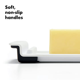 OXO Good Grips Butter Dish keeps butter on the tray, lid stays clean.