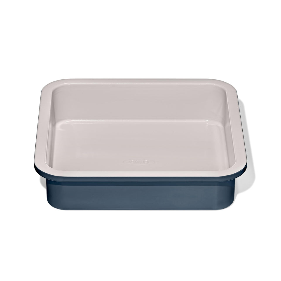 OXO Good Grips storm blue cake pan, top view, promotes even browning and straight layers.