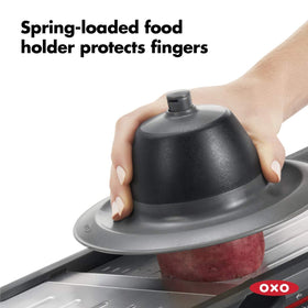 OXO Good Grips Mandoline 2.0 two-sided blade offers straight or crinkle cuts.