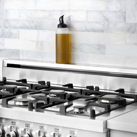 OXO Good Grips Chef's Squeeze Bottle Large pour spout enables thin drizzle for dressings