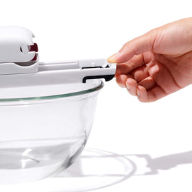 OXO Good Grips Cherry Pitter folds legs for compact storage