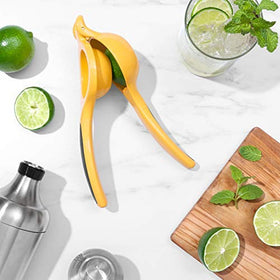OXO Good Grips Citrus Squeezer in action, seeds and pulp strained as you juice.