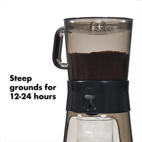 OXO Good Grips coffee maker switch activates filtration for easy brewing.