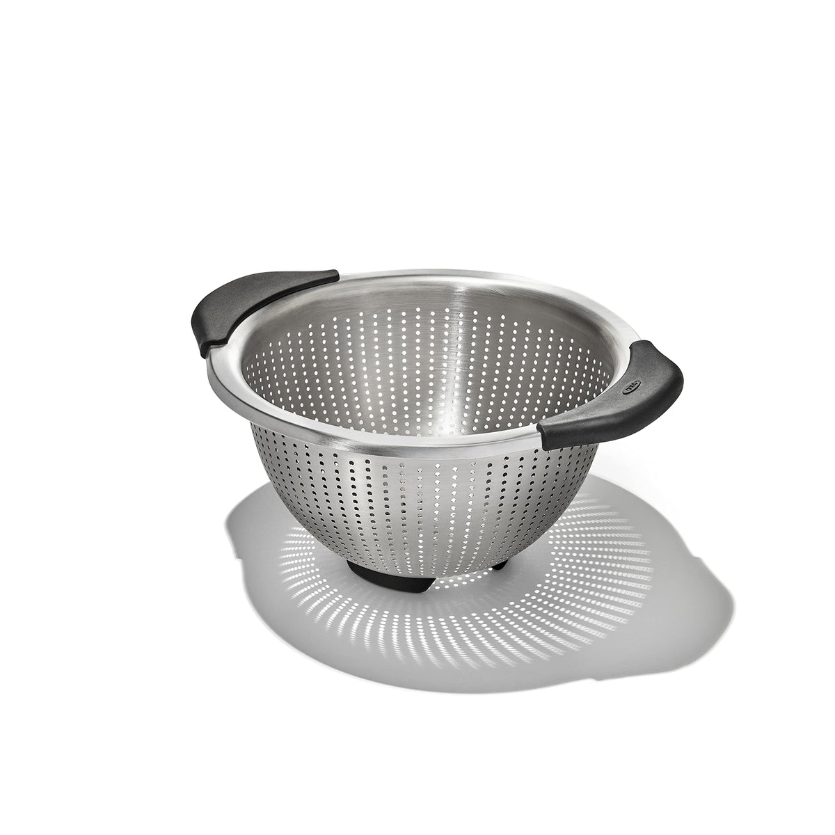 OXO Good Grips colander close-up shows elevated handles for comfortable rinsing