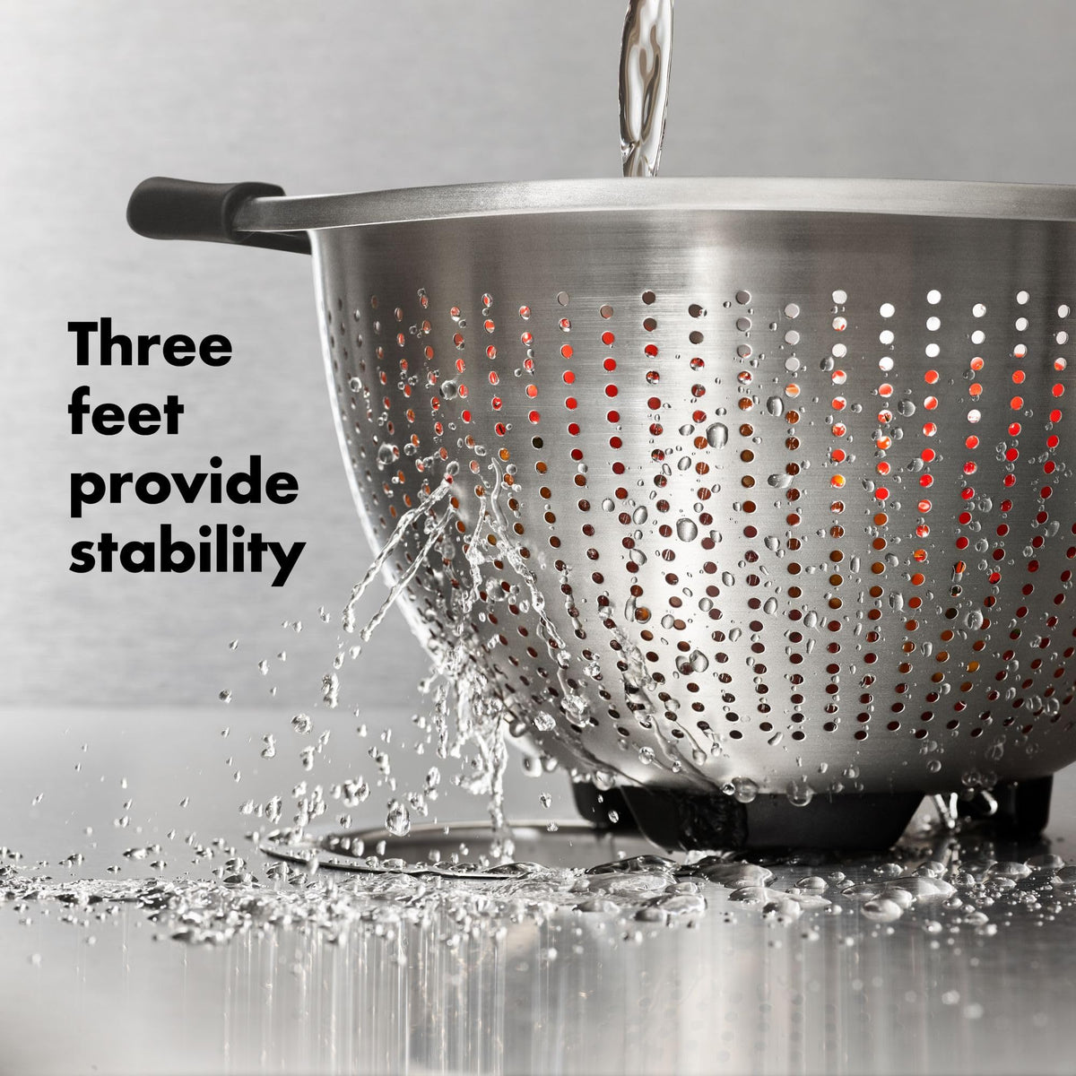 OXO Good Grips colander nested with mixing bowls for easy storage