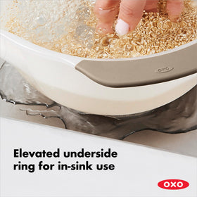 OXO Good Grips colander pour spout removes excess water for easy pouring.