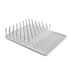 OXO Good Grips Compact Dish Rack biscuit, front view keeps dishes upright for quick drying.