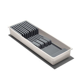 OXO Good Grips Compact Knife Drawer Organizer in a tidy drawer, saving space.