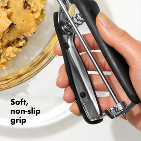 OXO Good Grips cookie scoop ejects dough with a spring-loaded lever for easy release