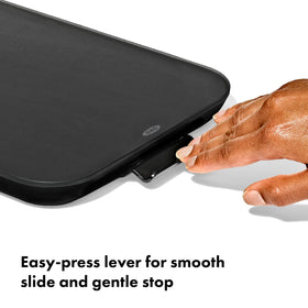 Close-up of the brake-lever on the OXO Countertop Slider enabling smooth stops