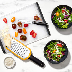 OXO Good Grips cutting board with meat and produce side separation helps prevent cross-flavor mixing