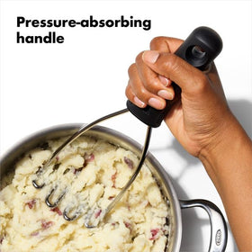 OXO Good Grips dishwasher-safe masher for quick cleanup after meals.
