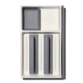 OXO Good Grips Drawer storage cup keeps small gadgets like wine stoppers organized