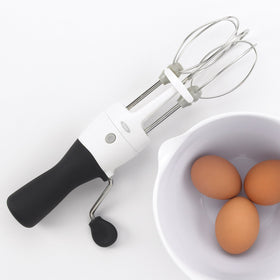 OXO Good Grips Egg Beater dishwasher safe base detaches for easy cleaning.