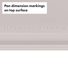OXO Good Grips ceramic coating promotes even browning on cookies and roasting trays.