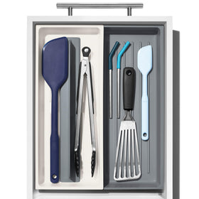OXO Good Grips Expandable Long Tool Organizer with adjustable dividers for configurable storage.