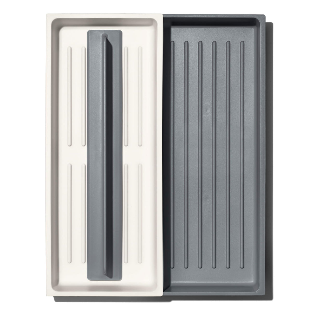 OXO Good Grips Expandable Long Tool Organizer, expanded to fit long-handled tools.