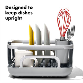 OXO Good Grips extendable arms adjusting to different sink sizes