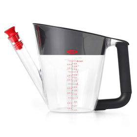 OXO Good Grips fat separator's clear body shows fat rising for easy separation.