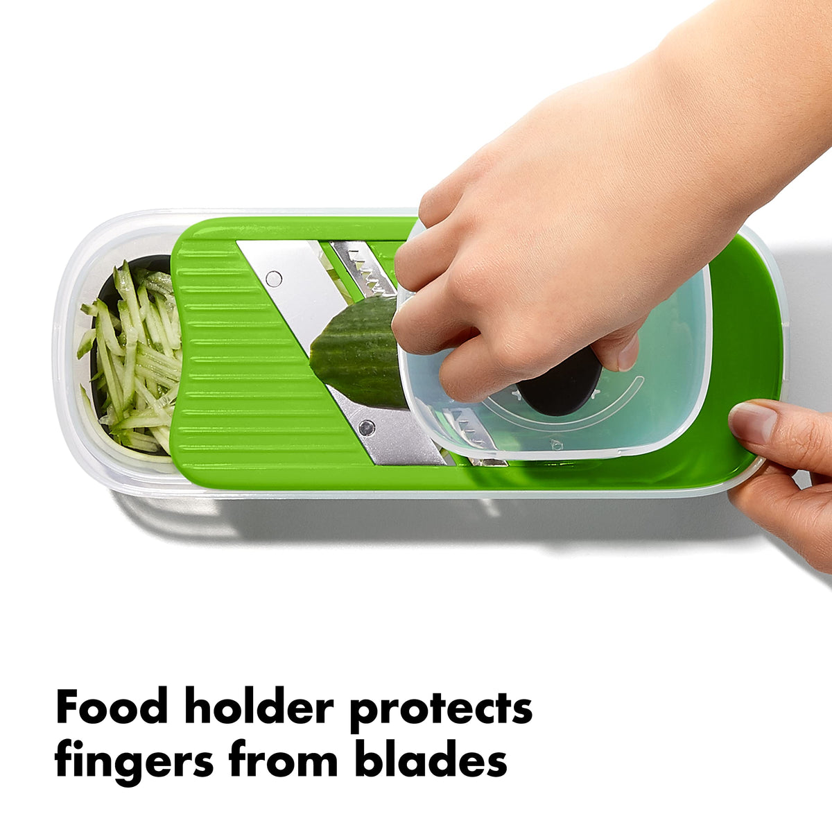 OXO Good Grips food holder safety feature keeps fingers safe during slicing tasks
