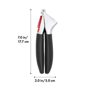 OXO Good Grips Garlic Press stores compactly in a kitchen drawer.