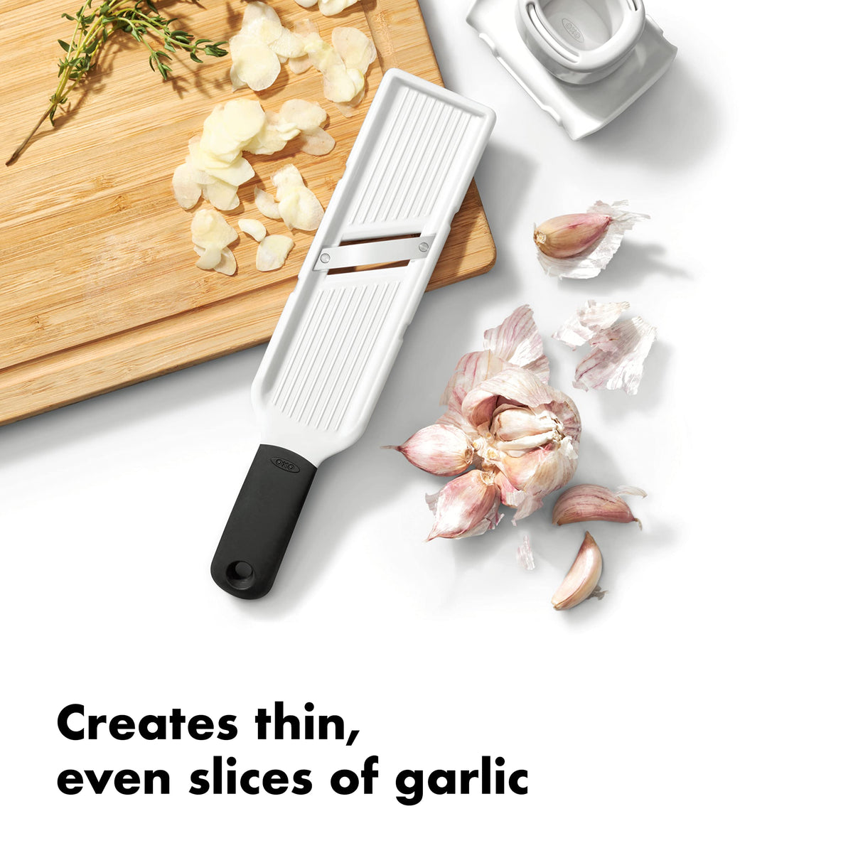 OXO Good Grips Garlic Slicer blade close-up with bi-directional stainless steel edge