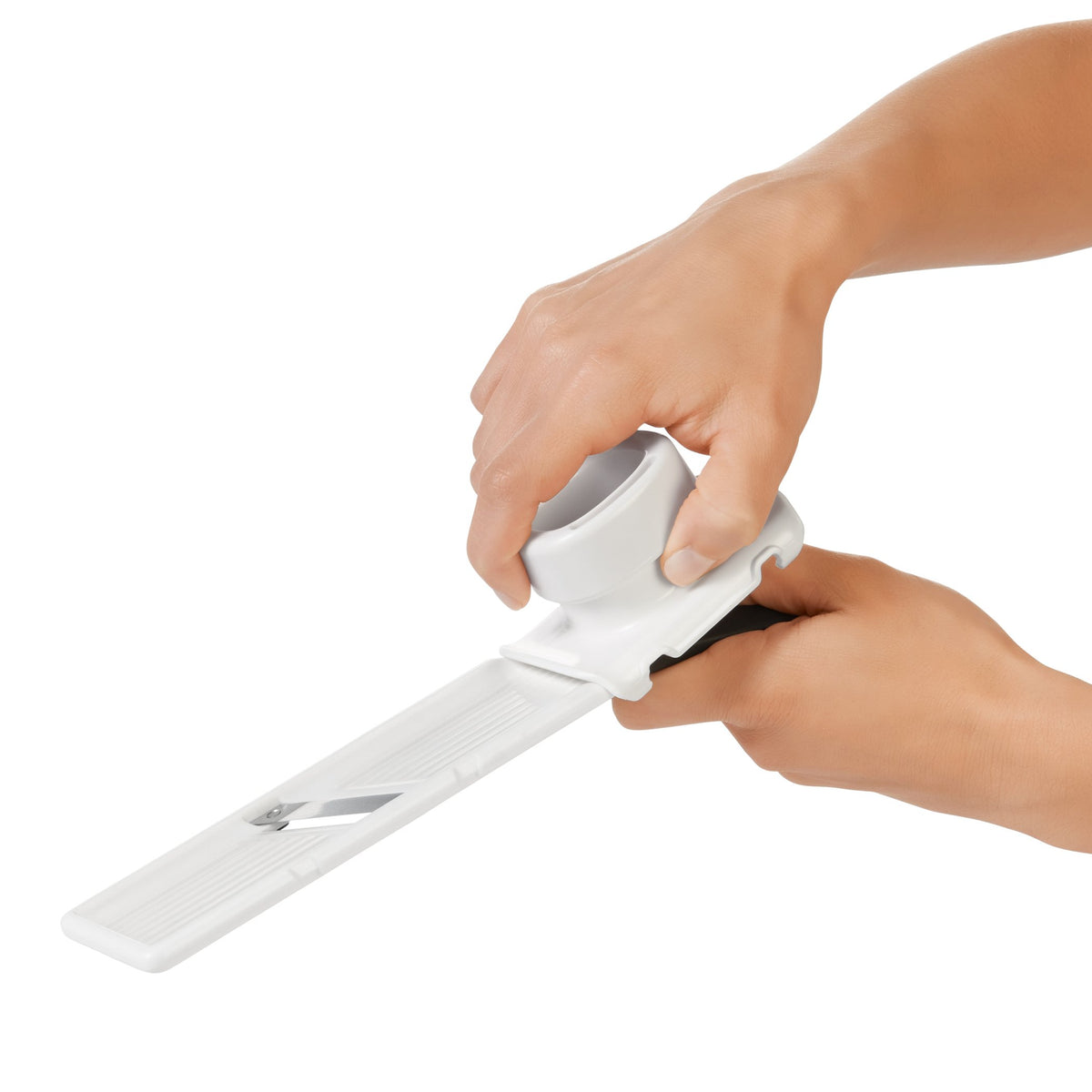 OXO Good Grips Garlic Slicer in action delivering thin, even slices quickly