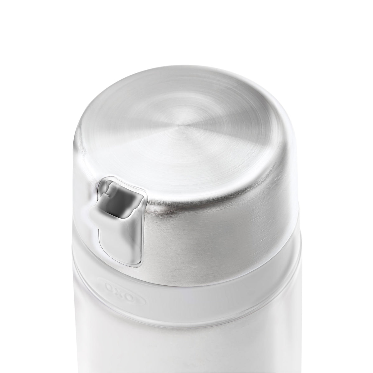 OXO Good Grips sugar dispenser in use on a kitchen counter for easy access.