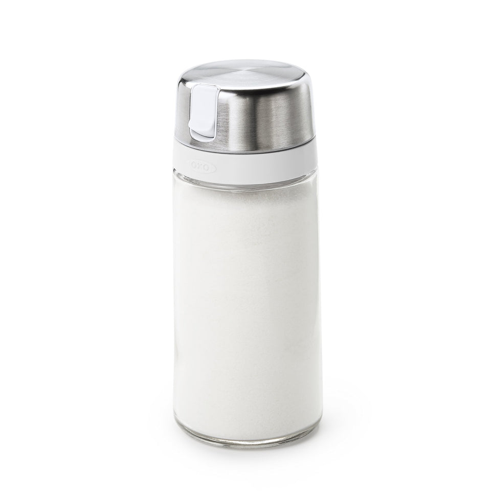 OXO Good Grips glass sugar dispenser with smooth spout for controlled pours.