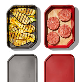 OXO Good Grips Grilling Prep & Carry System raised-bottom trays keep juices away from ingredients.