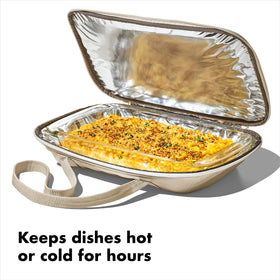 OXO Good Grips oat carrier has an easy-clean lining to protect against spills.