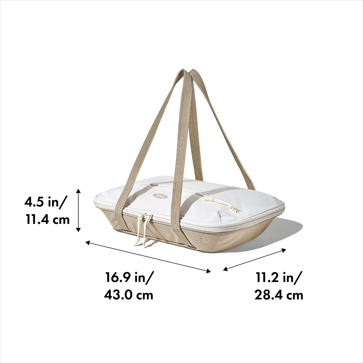 OXO Good Grips carrier features foam-insulated lining to keep casseroles hot or cold.