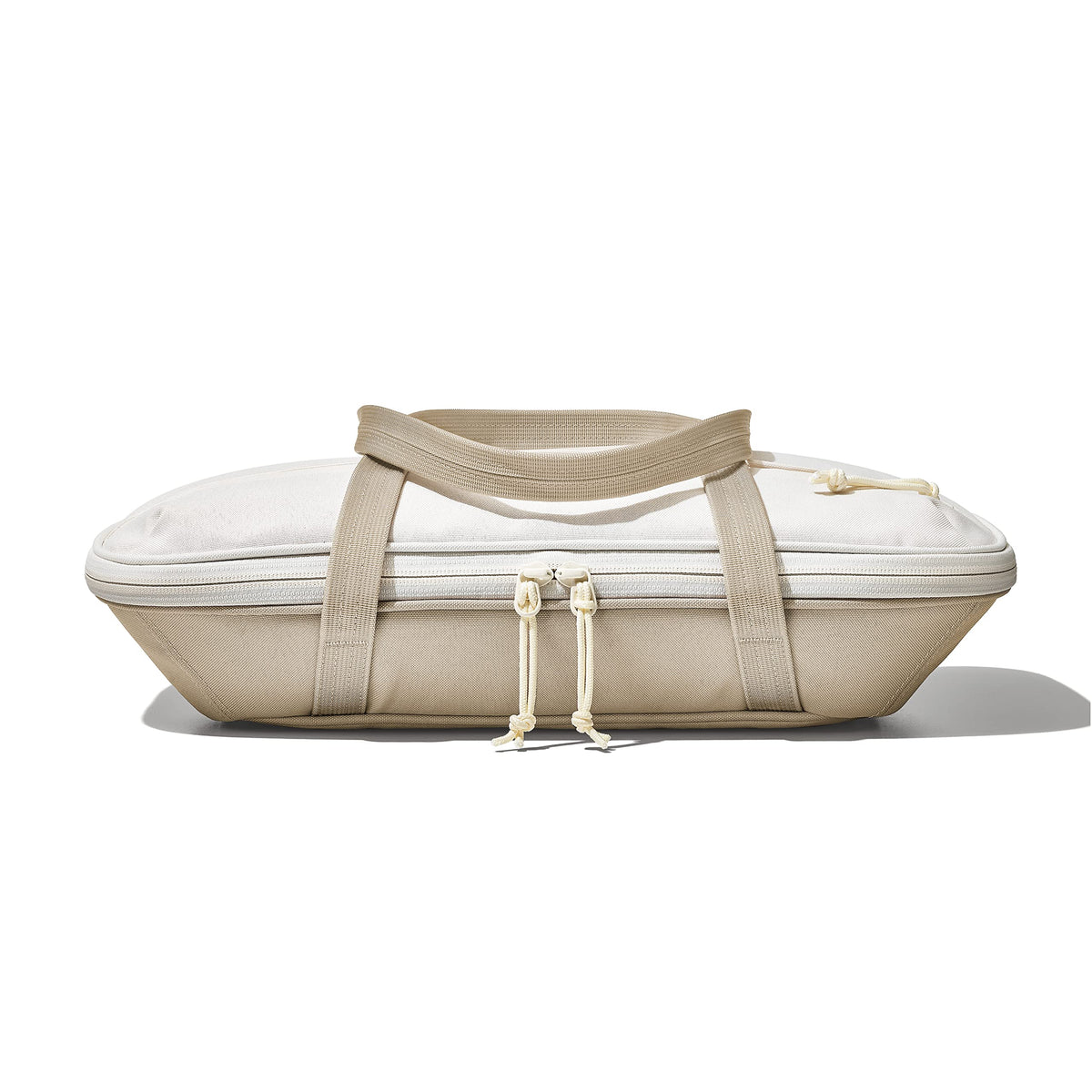 OXO Good Grips oat carrier front zip pocket keeps napkins and utensils handy.