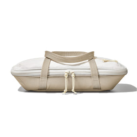 OXO Good Grips oat carrier front zip pocket keeps napkins and utensils handy.