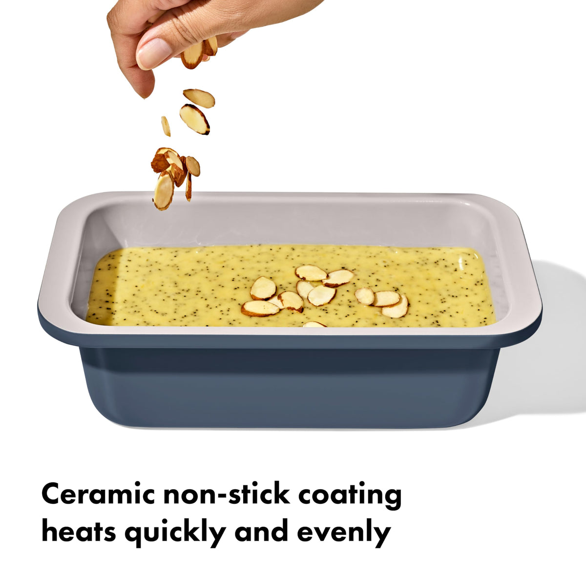 Close-up of OXO Good Grips loaf pan storm blue ceramic coating resisting sticking.