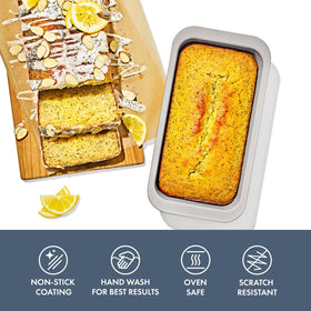 OXO Good Grips loaf pan storm blue, side view with sturdy handle for safe transfer.