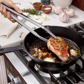 OXO Good Grips locking tongs with hanging loop for easy storage.
