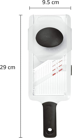 OXO food holder protects hands and covers blade when not in use.