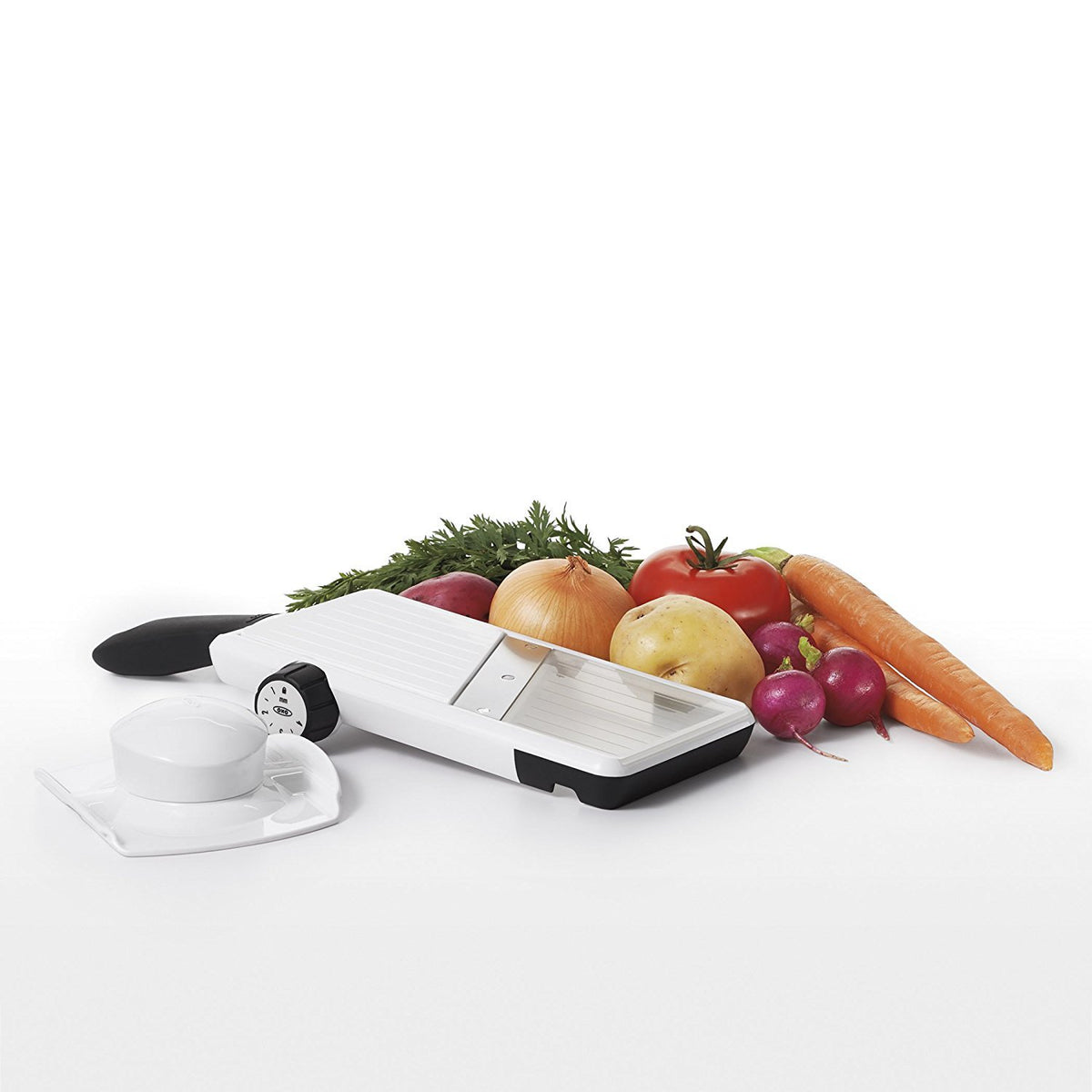 OXO Good Grips mandoline slicer food holder safeguards fingers during slicing.